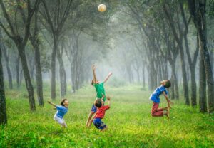 children playing in nature