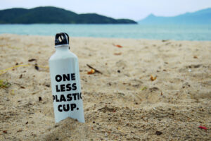 reusable bottle on beach