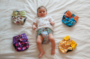 baby with reusable nappies